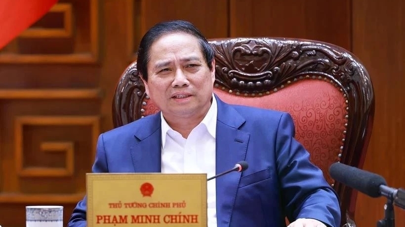 PM Pham Minh Chinh chairs meeting to draft resolutions on breakthroughs in health care, education