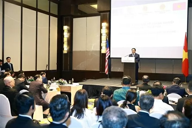 Prime Minister Pham Minh Chinh speaks at the Vietnam–Malaysia Business Meeting in Kuala Lumpur on May 25. (Photo: VNA) Prime Minister Pham Minh Chinh speaks at the Vietnam–Malaysia Business Meeting in Kuala Lumpur on May 25. (Photo: VNA)