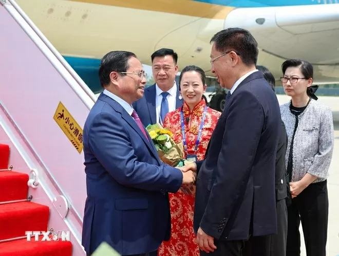 Prime Minister Pham Minh Chinh arrives in Tianjin for WEF meeting, working visit to China