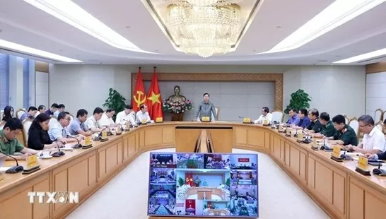 Deputy PM Tran Hong Ha speaks at the meeting. (Photo: VNA)