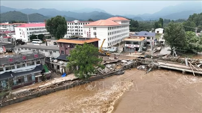 Vietnam extends sympathy to China over flood losses Vietnam extends sympathy to China over flood losses
