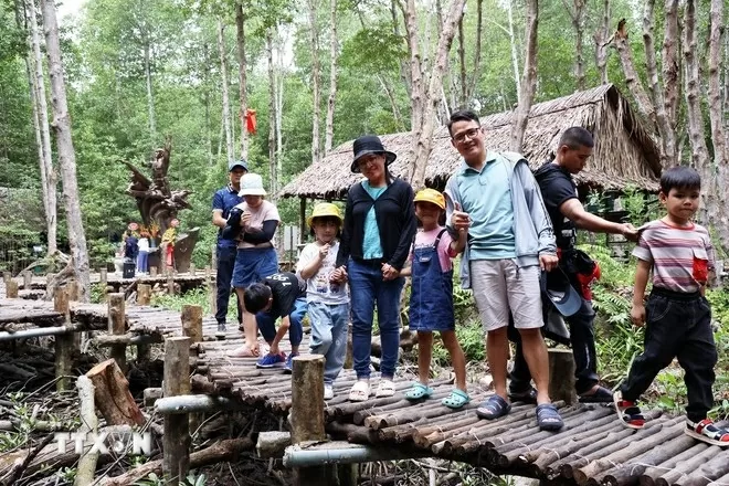 Tourists visit the Rung Sac Base in Binh Khanh commune, Ho Chi Minh City. (Photo: VNA)