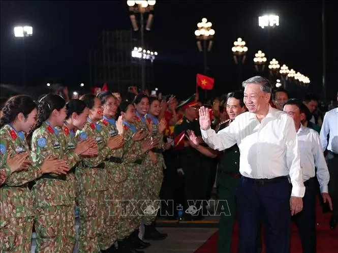 General Secretary of the Communist Party of Vietnam (CPV) and Secretary of the Central Military Commission To Lam attends the special national political–art programme “Under the Glorious Flag” in Hanoi. (Photo: VNA)