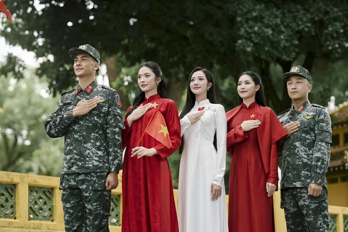 Top 3 Miss Vietnam 2024 join Ao Dai Project, showcasing enduring military - civilian solidarity