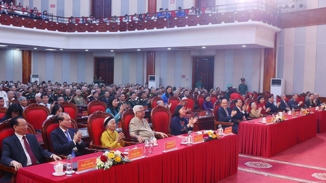 Hanoi meets with veteran cadres and contributors to honour and promote revolutionary traditions