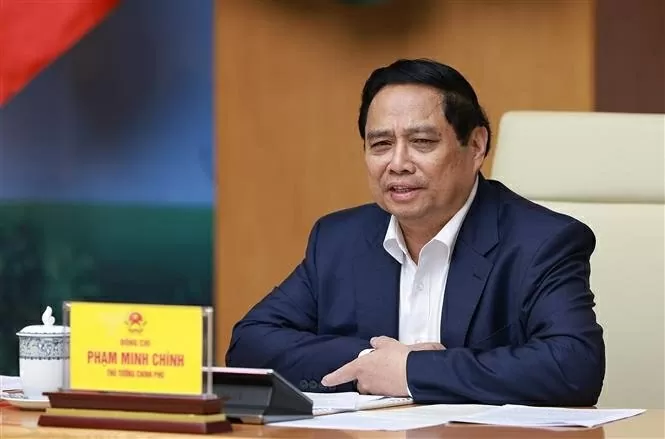 Prime Minister Pham Minh Chinh speaks at the event. (Photo: VNA)