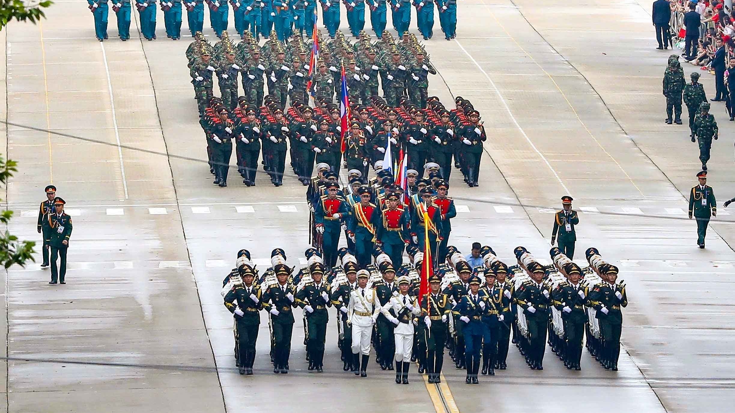 Observing Chinese, Russian, Laotian, and Cambodian soldiers at National Day parade rehearsal