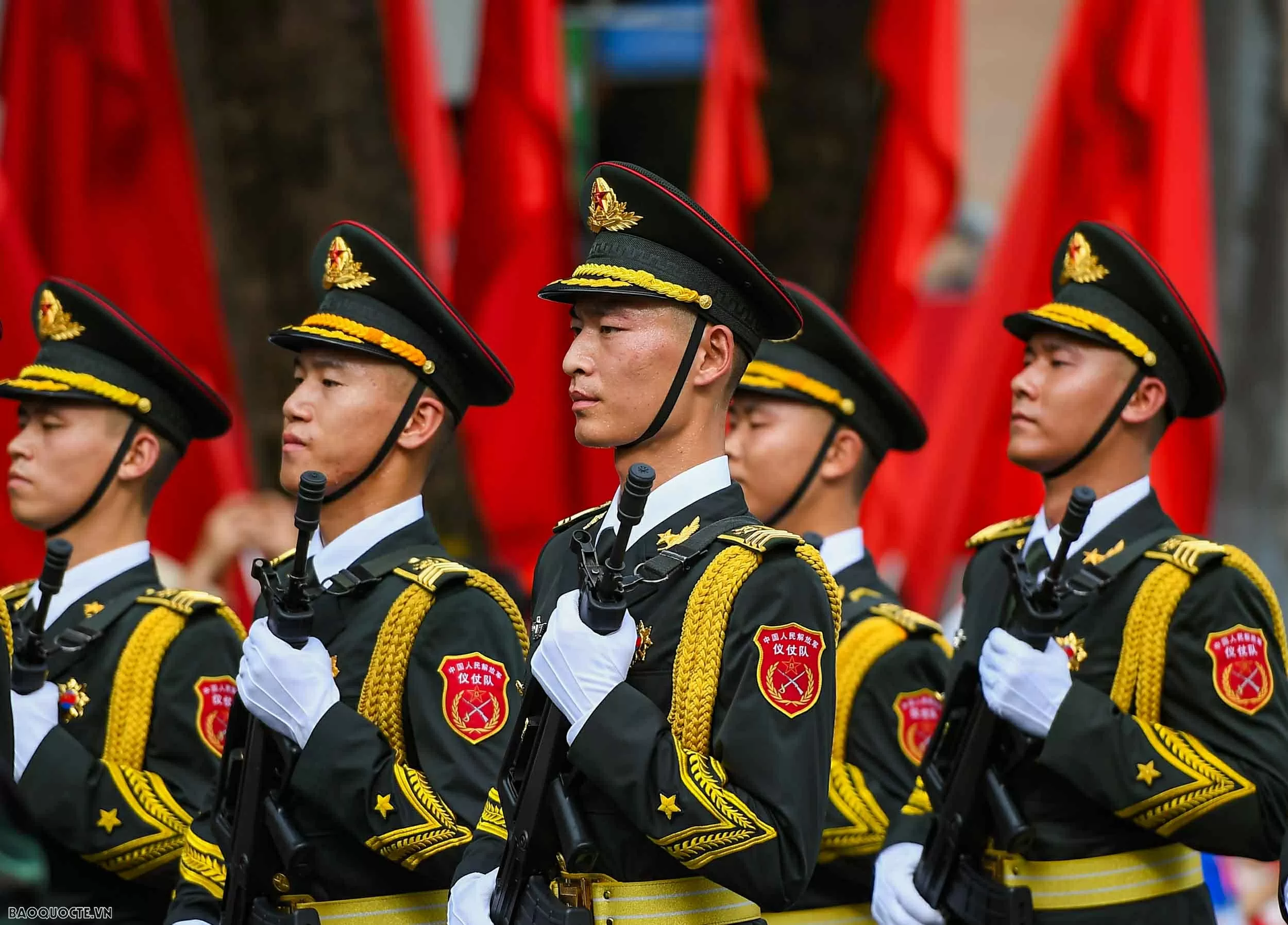Observing Chinese, Russian, Laotian, and Cambodian soldiers at National Day parade rehearsal