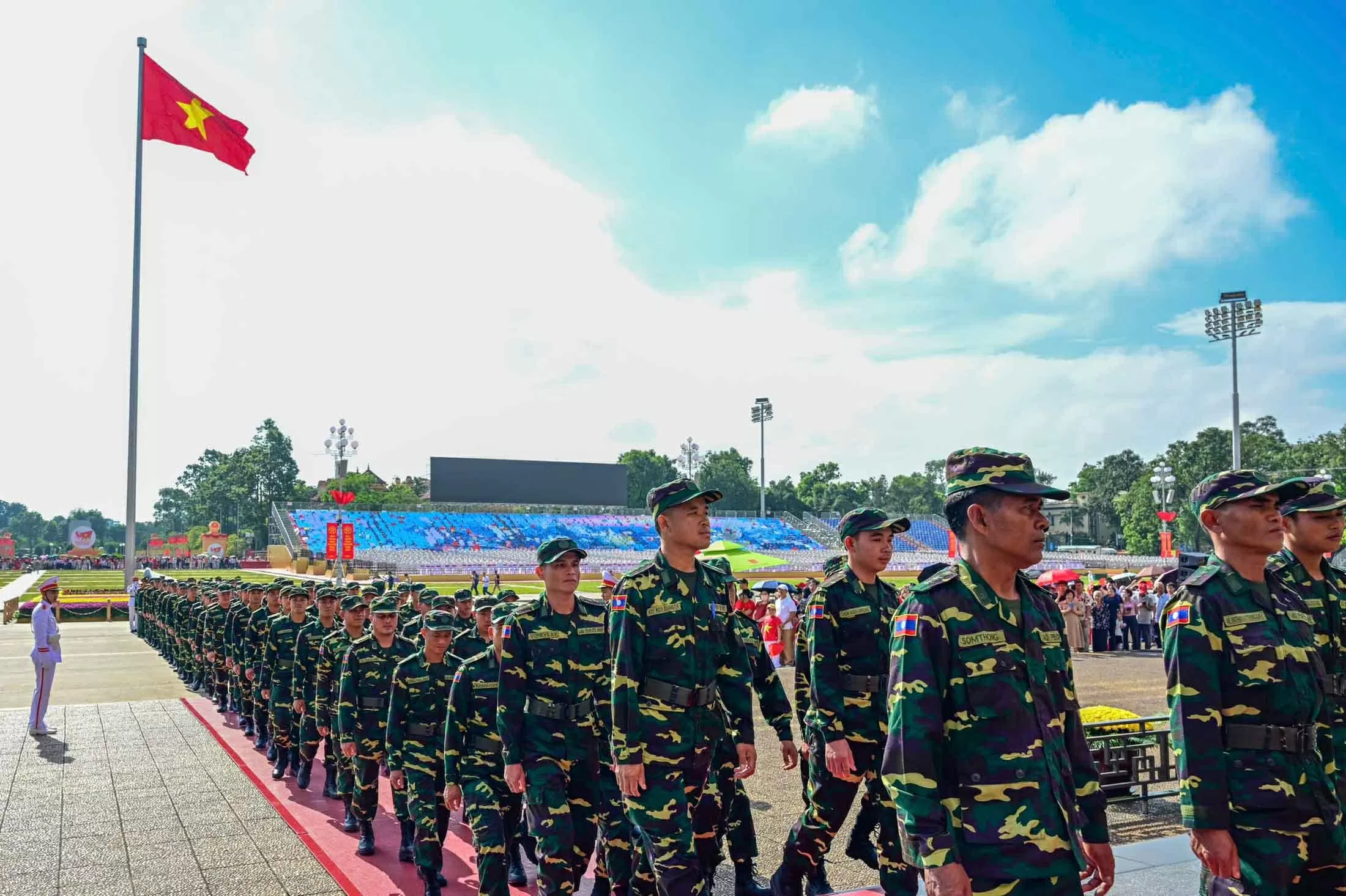 Russian, Lao, and Cambodian military personnel pay respects at President Ho Chi Minh Mausoleum