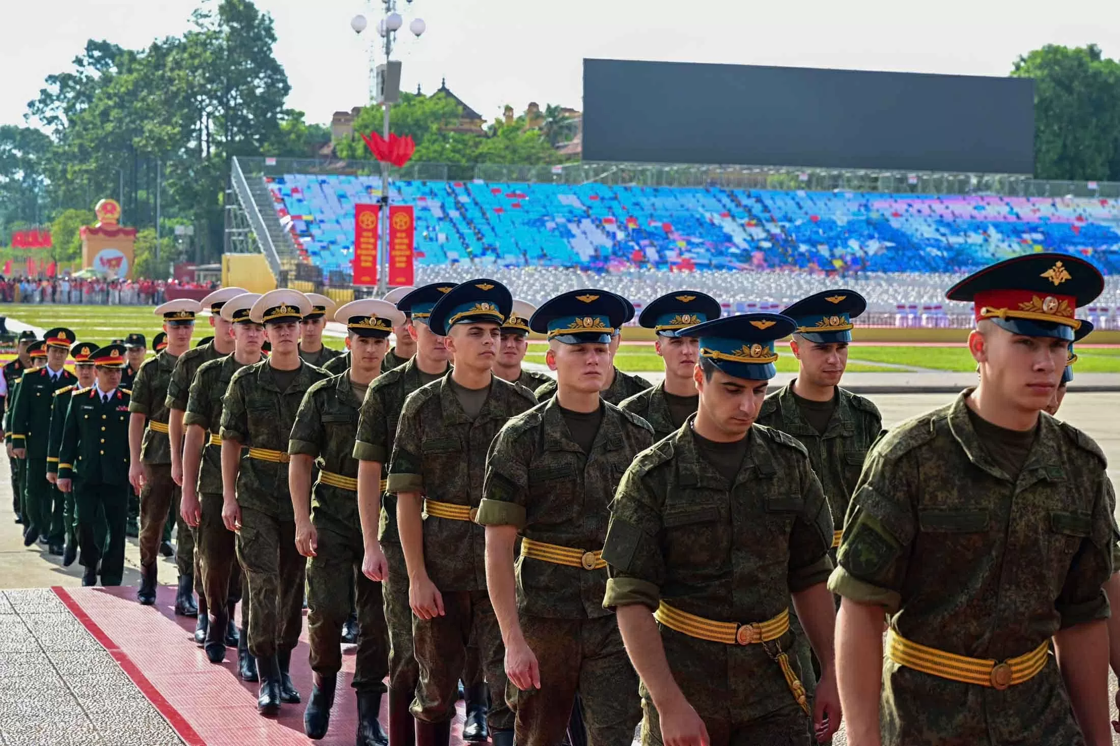 Russian, Lao, and Cambodian military personnel pay respects at President Ho Chi Minh Mausoleum