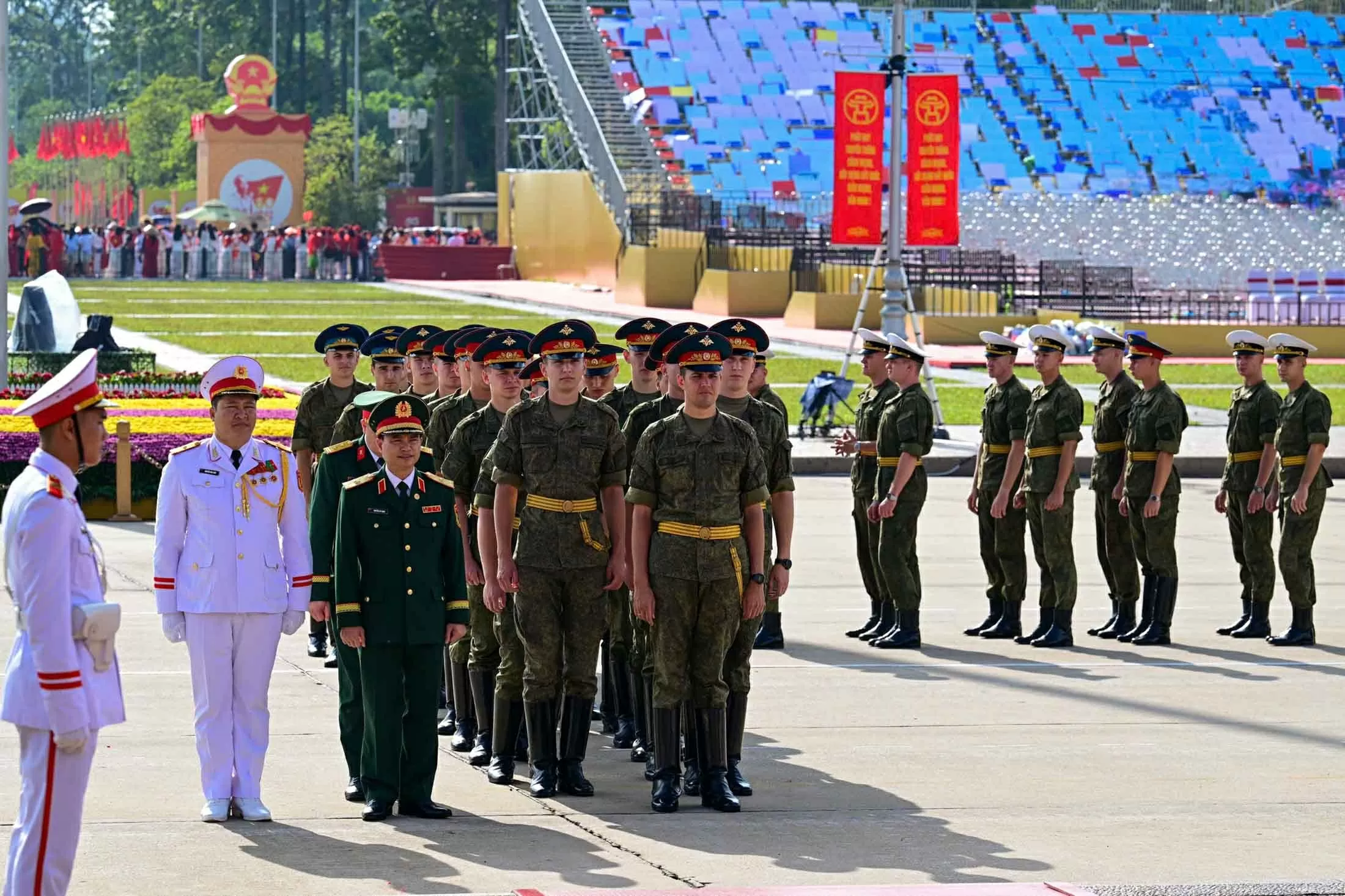 Russian, Lao, and Cambodian military personnel pay respects at President Ho Chi Minh Mausoleum