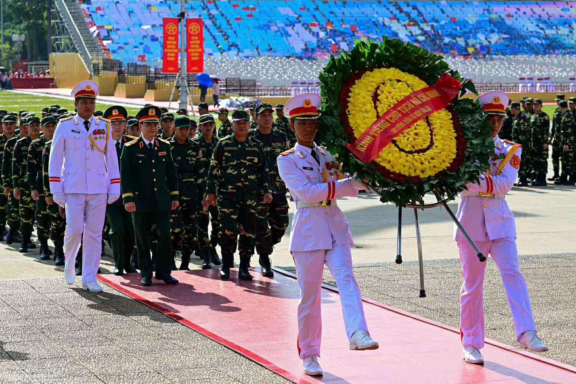 Russian, Lao, and Cambodian military personnel pay respects at President Ho Chi Minh Mausoleum