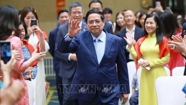Prime Minister Pham Minh Chinh meets with representatives of Vietnamese community in China
