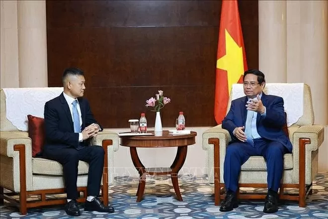 PM Pham Minh Chinh works with leaders of leading Chinese groups in Tianjin