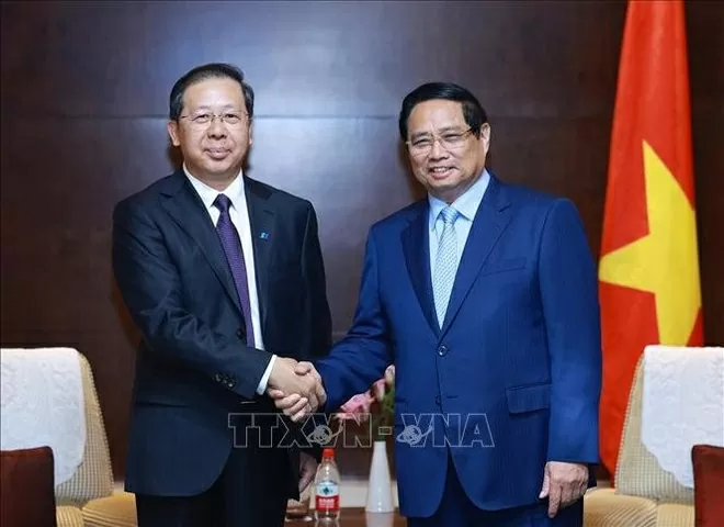PM Pham Minh Chinh works with leaders of leading Chinese groups in Tianjin