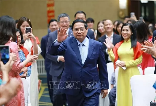 Prime Minister Pham Minh Chinh meets with representatives of Vietnamese community in China