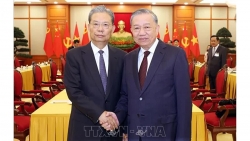 Vietnamese Party chief To Lam hosts reception for visiting top Chinese legislator