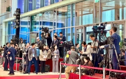 MOFA units ensure dedicated support for the international press during the signing of the Hanoi Convention