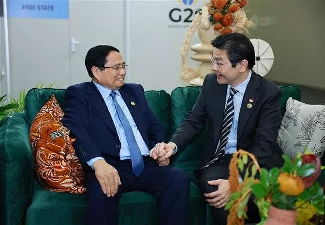 Vietnamese Prime Minister discusses ways to enhance ties with Dutch, Singaporean counterparts in South Africa