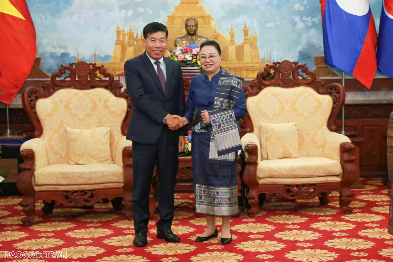 Deputy FM Nguyen Manh Cuong congratulates Lao Embassy in Vietnam on National Day