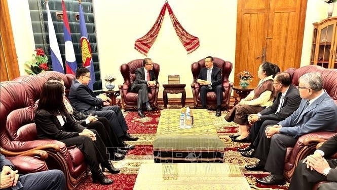 Ambassador Dang Minh Khoi congratulates Lao Ambassador to Russia Siphandone Oybuabuddy