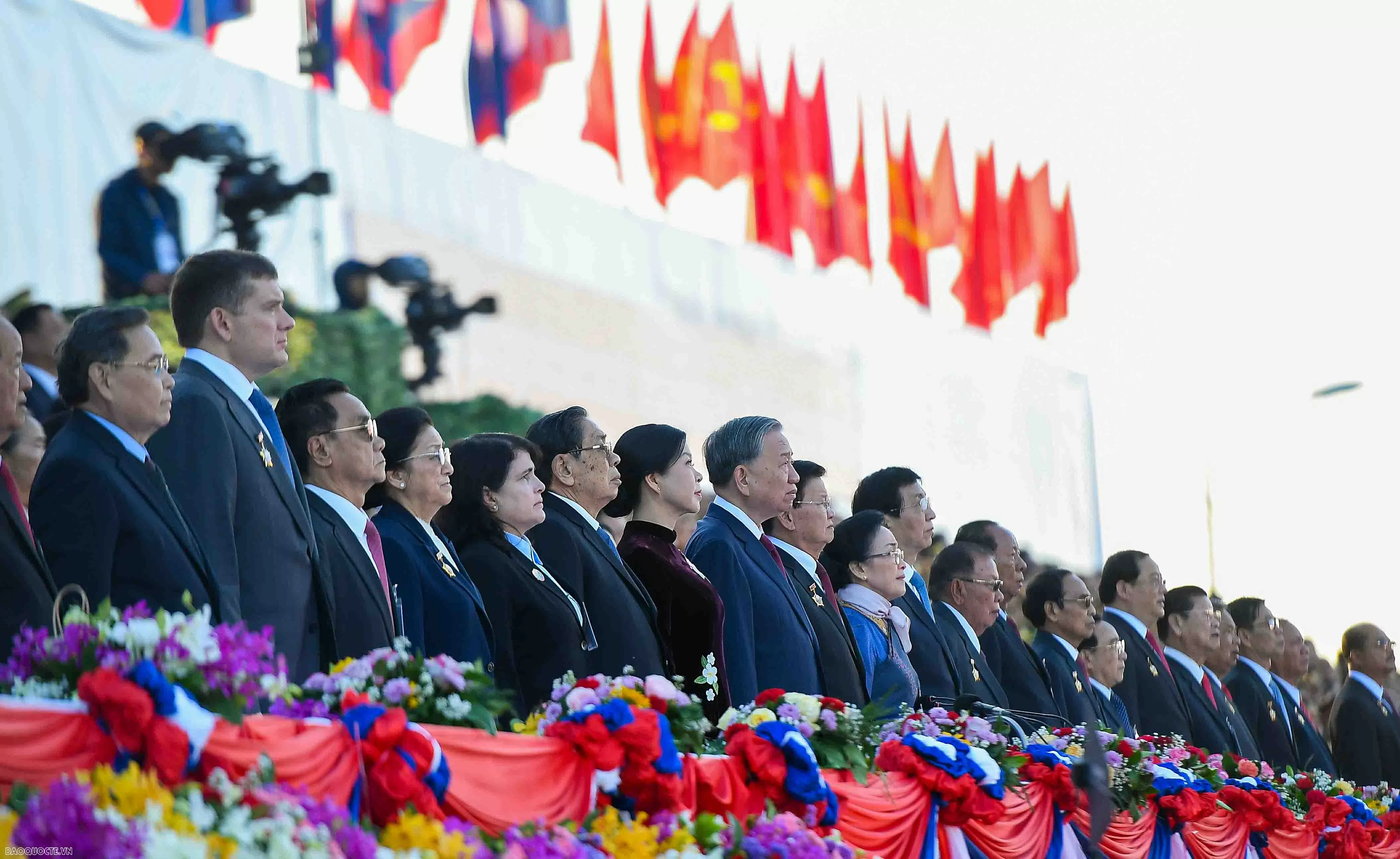 General Secretary To Lam and spouse attend 50th anniversary of Laos National Day