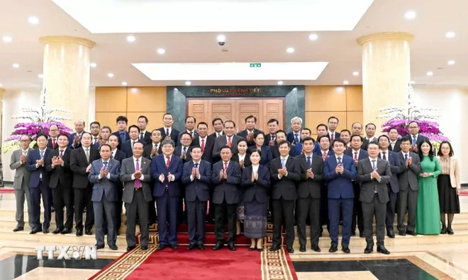 Politburo Member Tran Cam Tu welcomes high-level delegation from the Lao People's Revolutionary Party