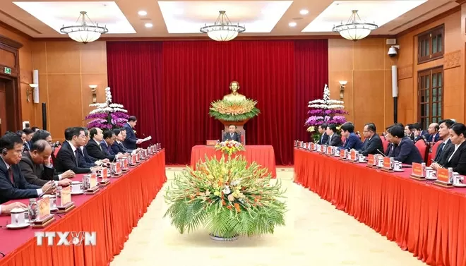 Politburo Member Tran Cam Tu welcomes high-level delegation from the Lao People's Revolutionary Party