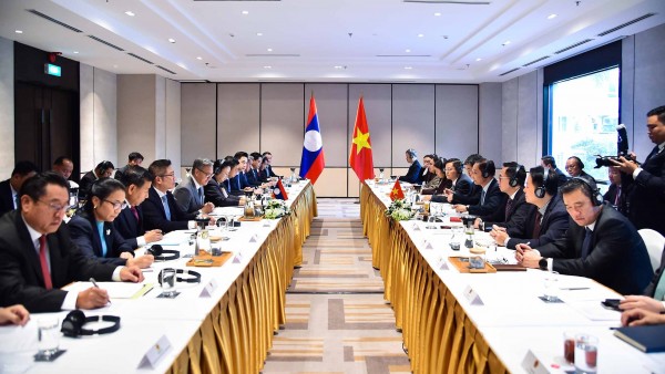 Vietnam, Laos Foreign Ministers hold 12th Political Consultation in Hanoi
