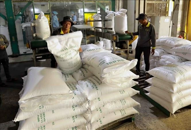Sản phẩm gạo đóng gói và xuất khẩu. (Nguồn: TTXVN) Sản phẩm gạo đóng gói và xuất khẩu. (Nguồn: TTXVN)