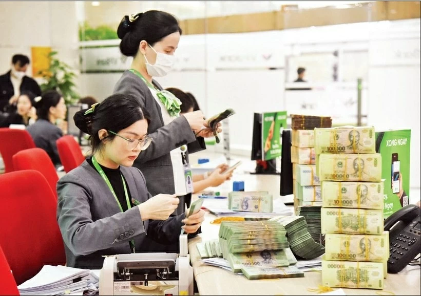Commercial banks are providing approximately 88% of total green credit outstanding in Vietnam. (Photo: nhandan.vn)