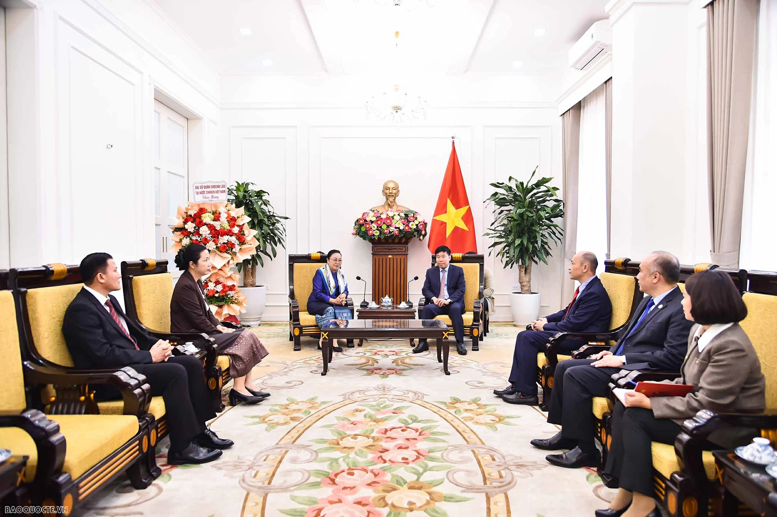 Deputy Foreign Minister Nguyen Manh Cuong receives Lao Ambassador to Vietnam on the 96th anniversary of the CPV founding