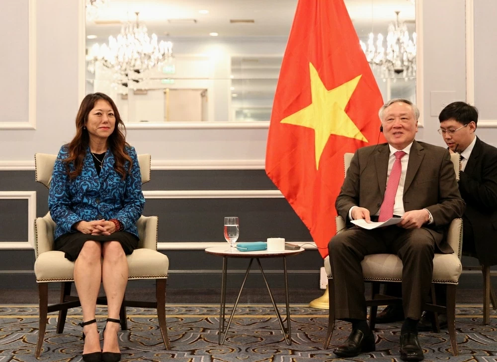 Deputy PM Nguyen Hoa Binh attends forum promoting Vietnam–US financial and technological cooperation