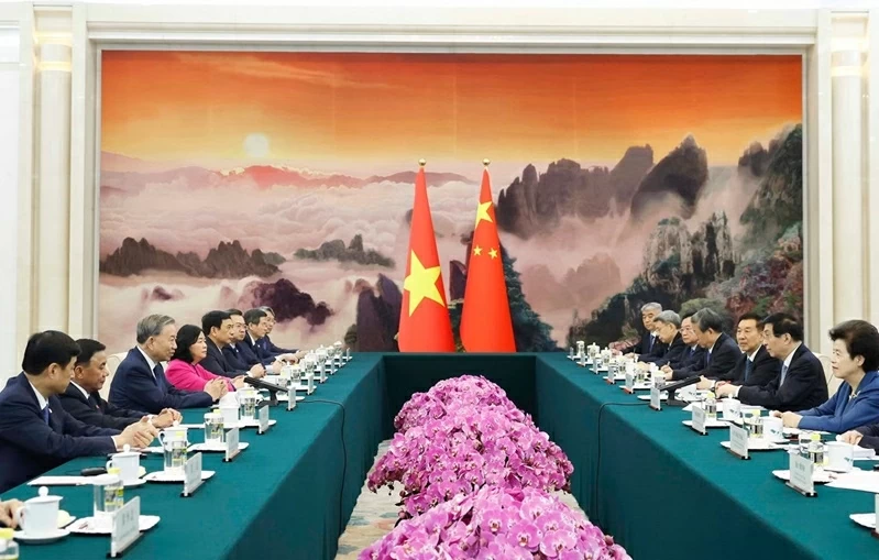 General Secretary, President To Lam meets with Chairman of Chinese People’s Political Consultative Conference  Wang Huning