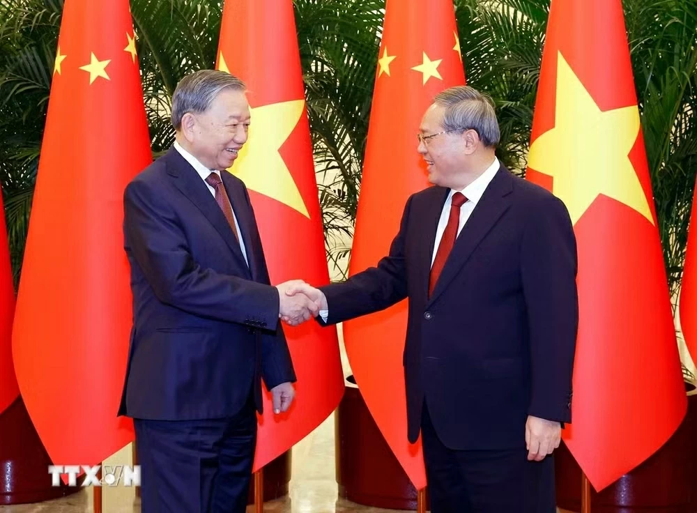 General Secretary, President To Lam meets Chinese Premier Li Qiang in Beijing