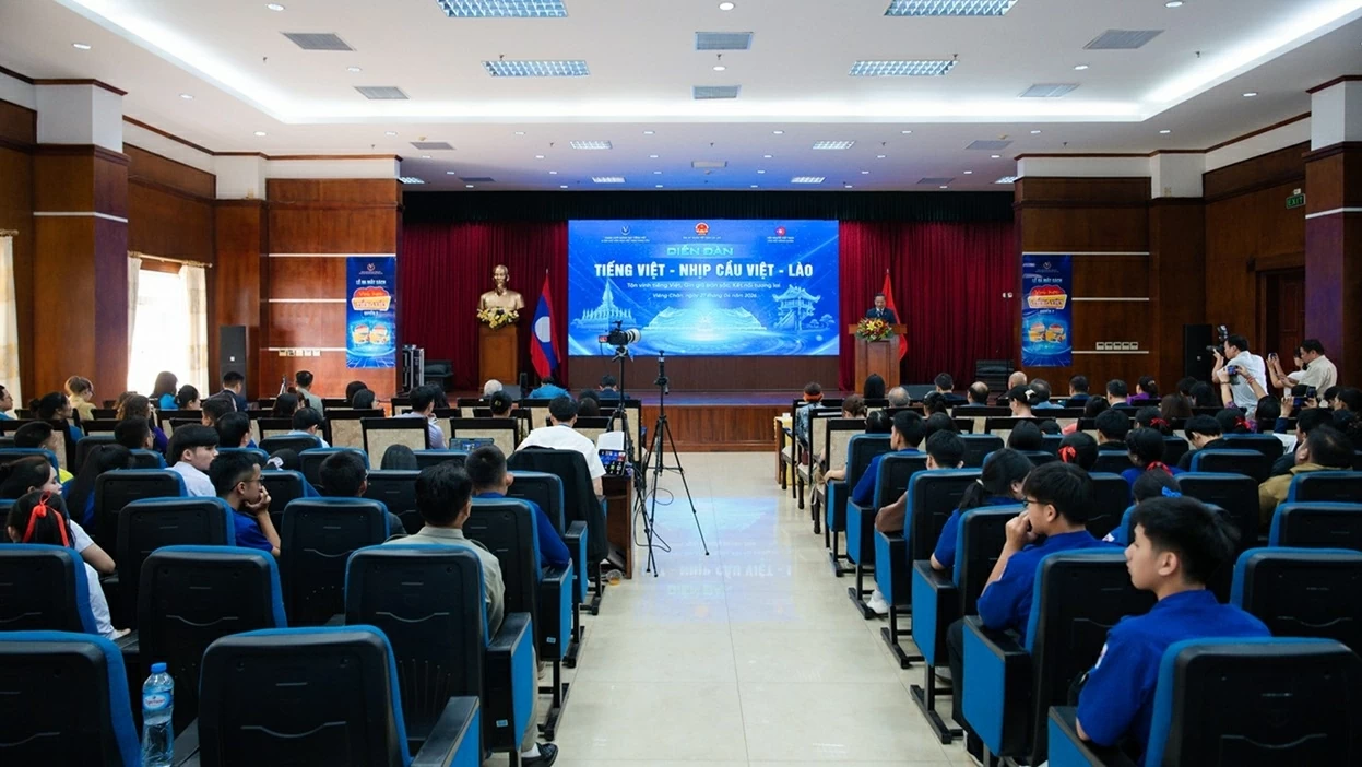 Forum 'Vietnamese Language - Vietnam-Laos Bridge': Preserving roots, strengthening solidarity, spreading friendship Forum 'Vietnamese Language - Vietnam-Laos Bridge': Preserving roots, strengthening solidarity, spreading friendship
