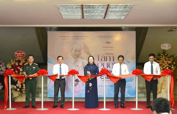 Exhibition honours 136 exemplary figures in studying and following Ho Chi Minh's ideology, morality