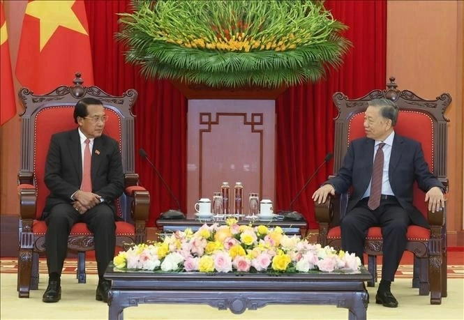 General Secretary, President To Lam: Vietnam gives highest priority to strengthening relations with Laos