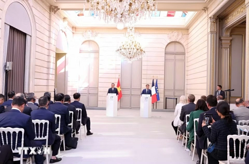 General Secretary, President To Lam and French President meet press ahead of talks in Paris