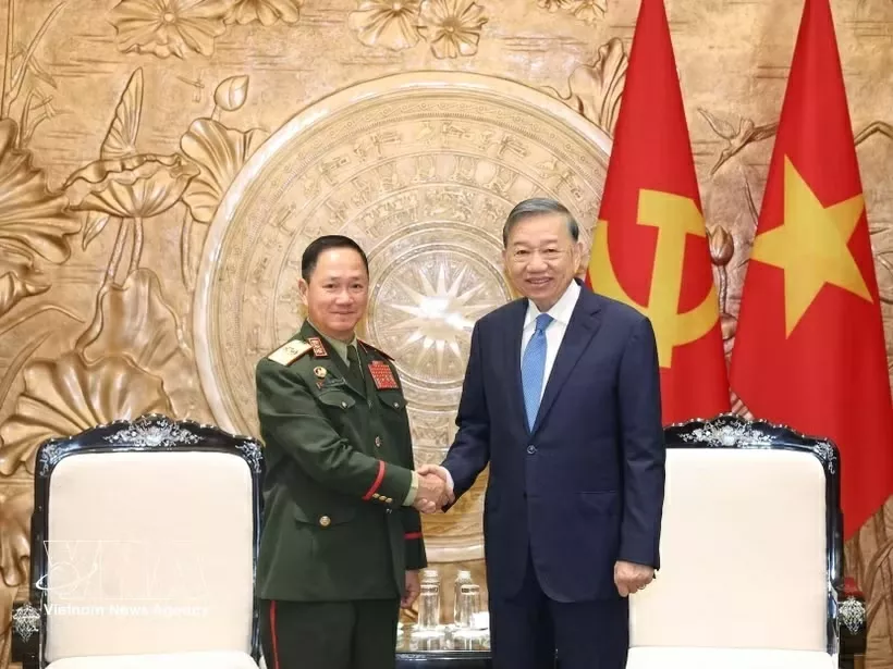 General Secretary, President To Lam hosts Lao Deputy Prime Minister and Defence Minister General Khamlieng Outhakaisone