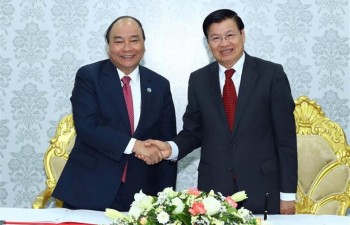 Vietnamese, Lao PMs visit Star Telecom