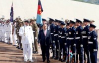 pm phuc hosts welcome ceremony holds talks with lao counterpart