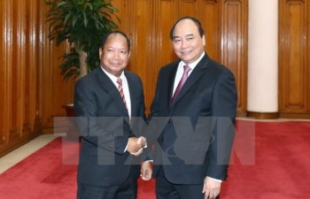 PM calls for stronger security ties with Laos
