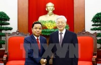 president vietnam gives top priority to boosting ties with laos