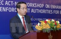 vietnam france shake hands in combating corruption