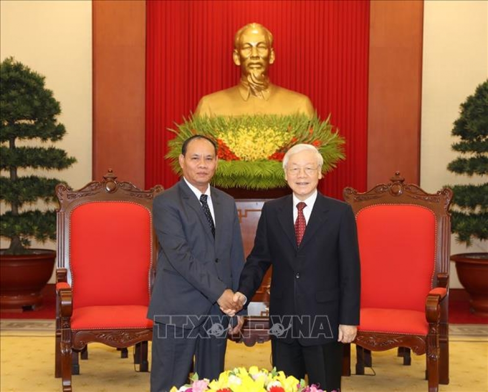 top leader welcomes lao minister of public security