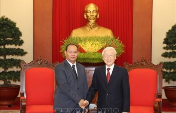 Top leader welcomes Lao Minister of Public Security