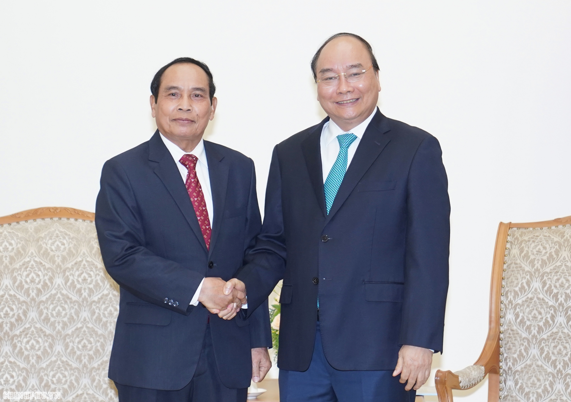 pm nguyen xuan phuc vietnam ready to partner with laos in inspection work