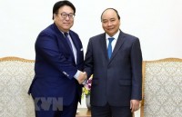 deputy pm trinh dinh dung receives japanese guest