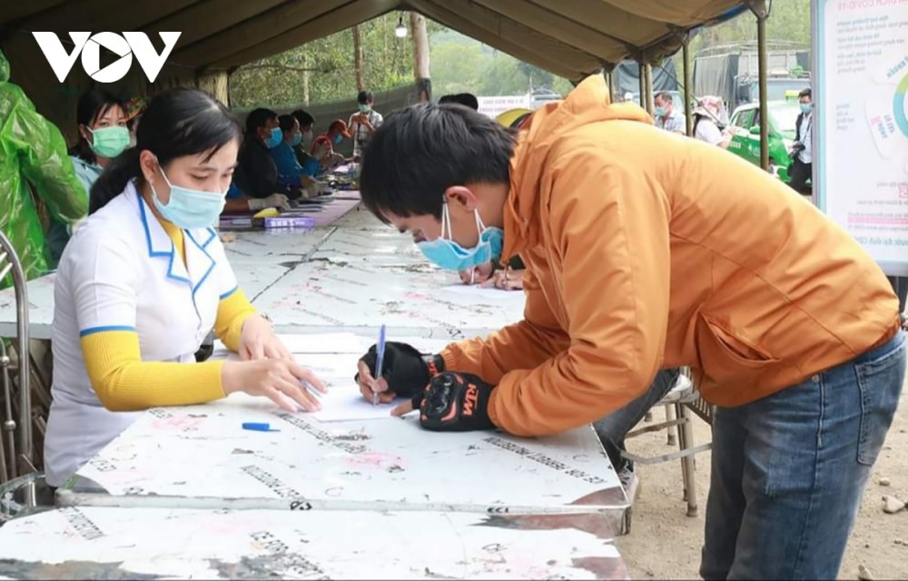 Making health declarations in Gia Lai province, a locality viewed as a new hotspot in Vietnam.